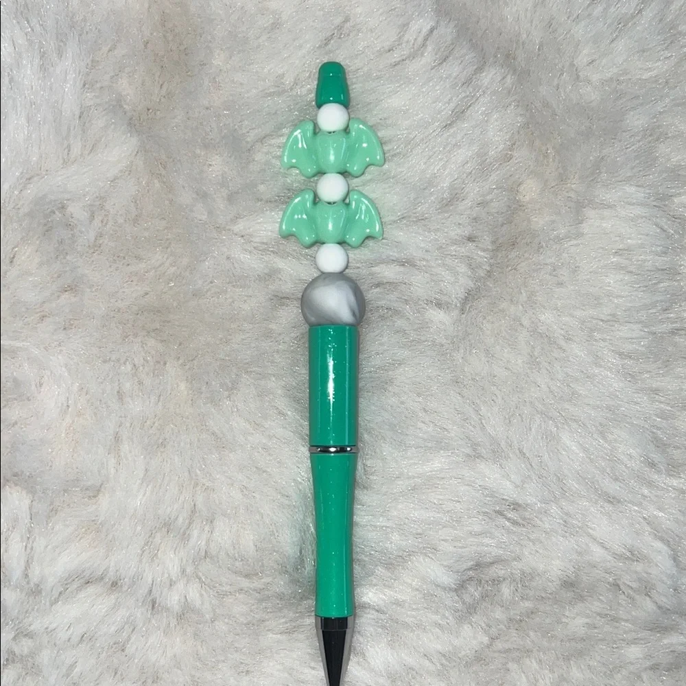 Green and Silver Decorative Pen